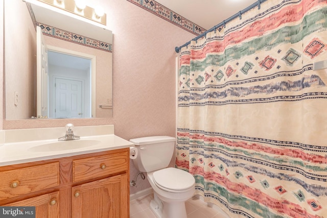 full bathroom with tile patterned flooring, a shower with curtain, toilet, and vanity