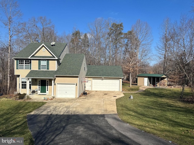 view of front of property with a garage, concrete driveway, a front lawn, and roof with shingles