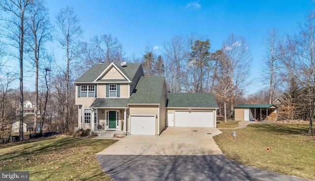 traditional-style home featuring a garage, driveway, a front lawn, and roof with shingles