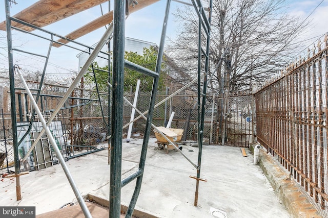 snow covered patio with fence