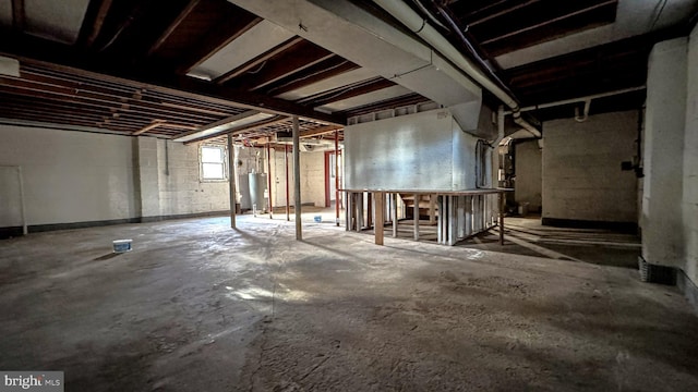 basement featuring gas water heater