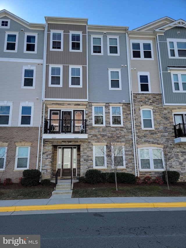 view of building exterior with entry steps