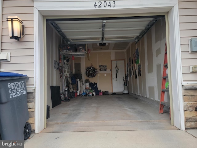 garage featuring a garage door opener