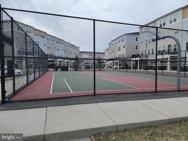 view of sport court with community basketball court and fence