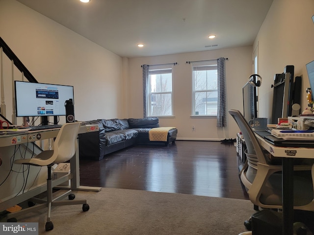 office space with baseboards, dark wood-style flooring, visible vents, and recessed lighting