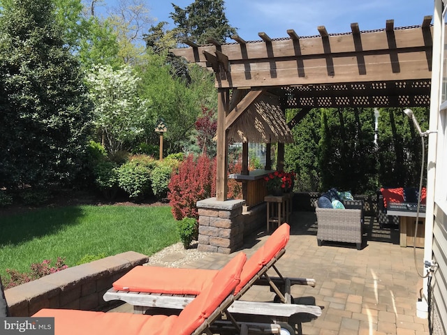 view of patio featuring a pergola