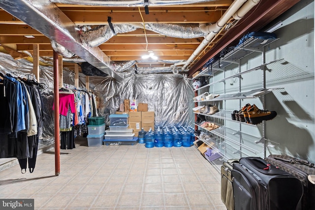 unfinished basement with tile patterned floors