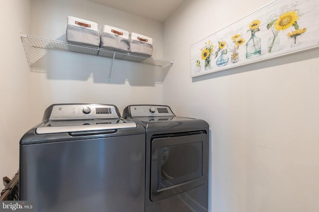 laundry room featuring laundry area and separate washer and dryer