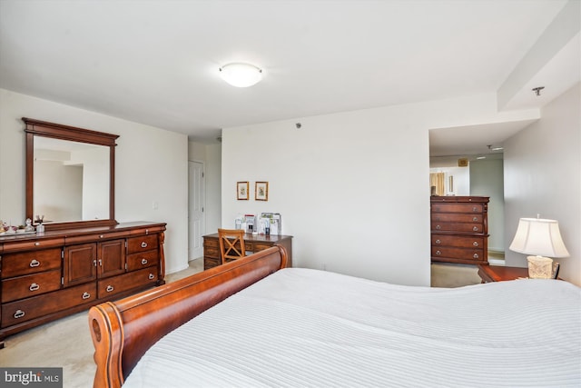 bedroom with light carpet