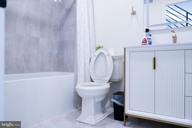 bathroom featuring toilet, shower / bathtub combination with curtain, and a sink