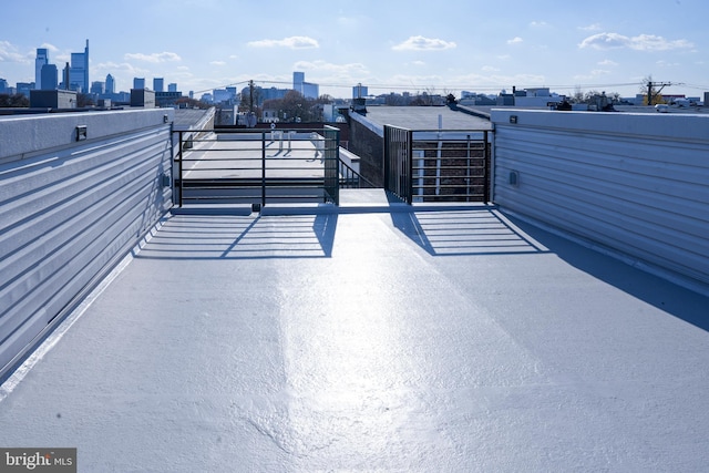 view of patio / terrace featuring a balcony and a city view