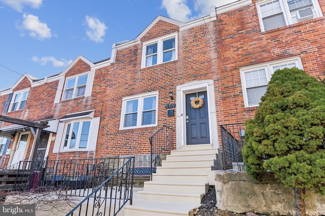 multi unit property featuring brick siding