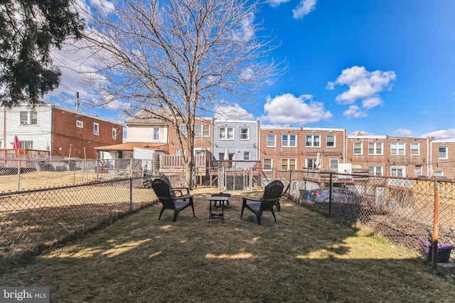 view of yard featuring a residential view and fence