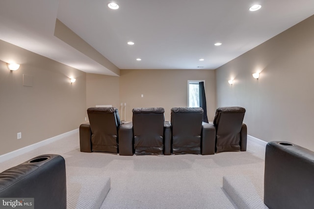 carpeted home theater room featuring baseboards and recessed lighting