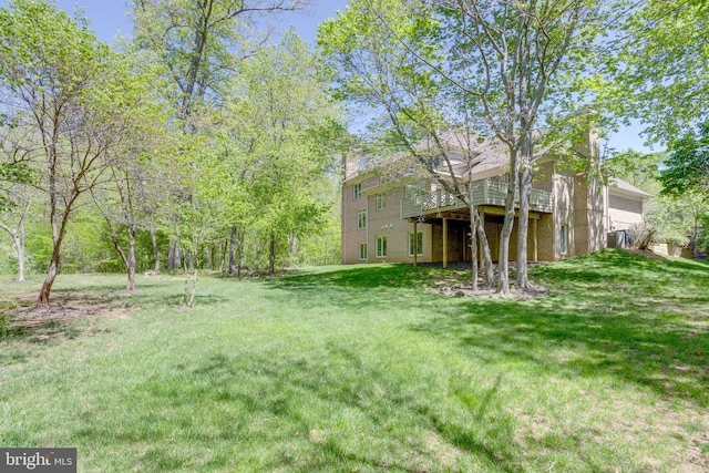 view of yard featuring a deck