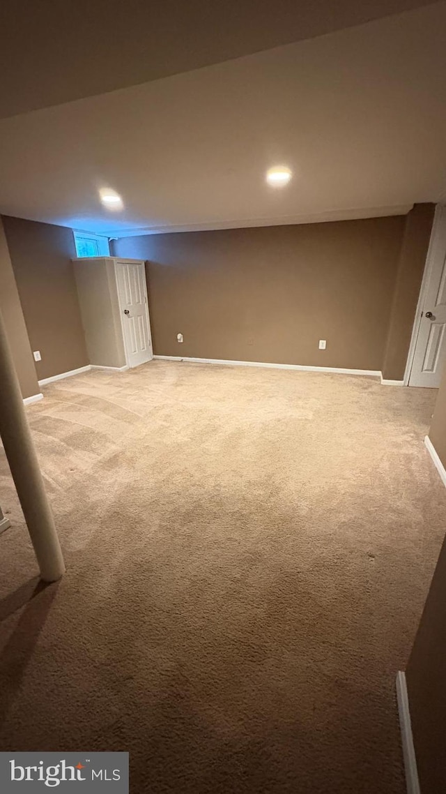5716 Willowton Ave, Baltimore, MD 21239 - finished below grade area featuring carpet and baseboards