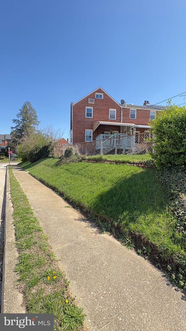 5716 Willowton Ave, Baltimore, MD 21239 - exterior space featuring fence and a front lawn