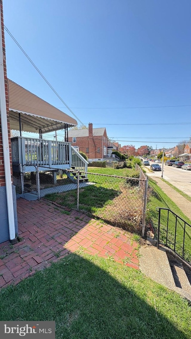 5716 Willowton Ave, Baltimore, MD 21239 - view of yard with a deck and fence