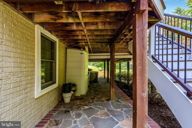 view of patio / terrace featuring stairway