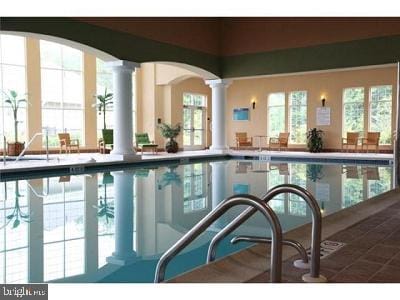 pool with decorative columns