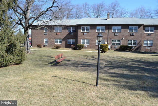 exterior space with a yard