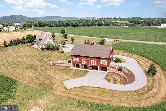 drone / aerial view with a rural view and a mountain view