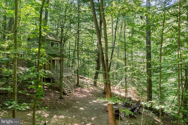 view of landscape with a view of trees