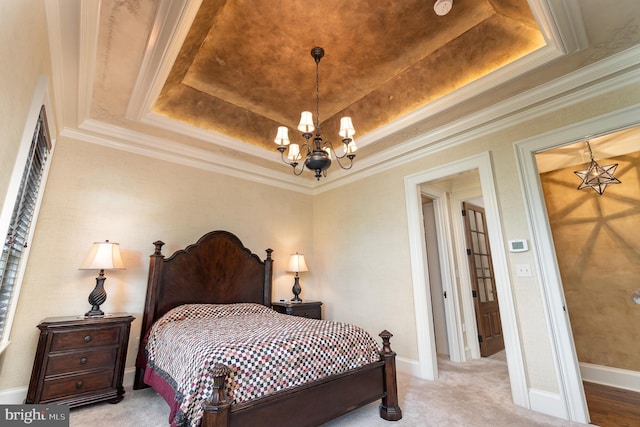 bedroom with a notable chandelier, a raised ceiling, ornamental molding, light carpet, and baseboards