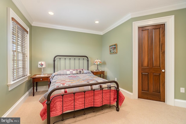 carpeted bedroom featuring baseboards, ornamental molding, and recessed lighting