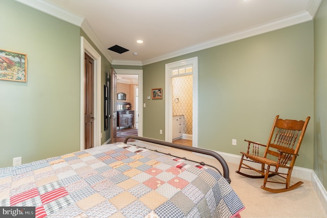 carpeted bedroom with recessed lighting, crown molding, baseboards, and ensuite bathroom