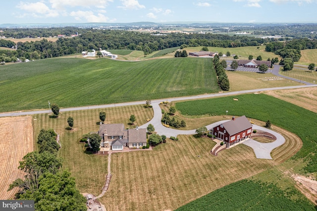 birds eye view of property featuring a rural view