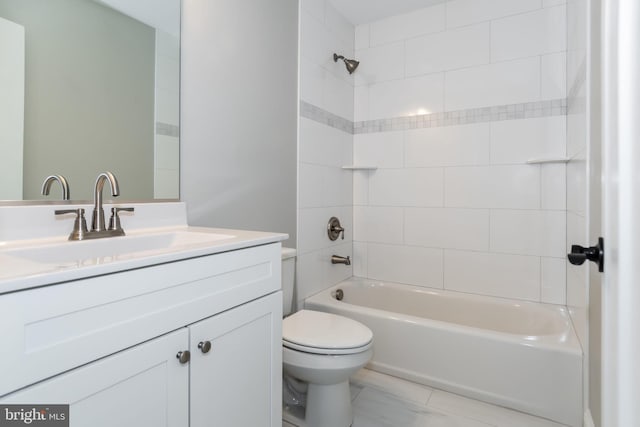 full bath with toilet, vanity, and shower / tub combination