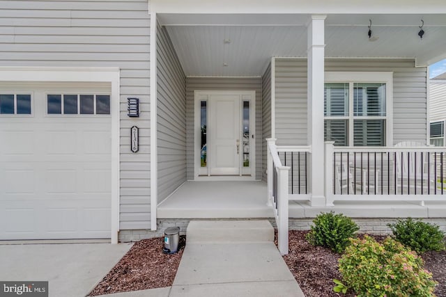 property entrance with covered porch