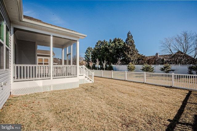 view of yard with a fenced backyard