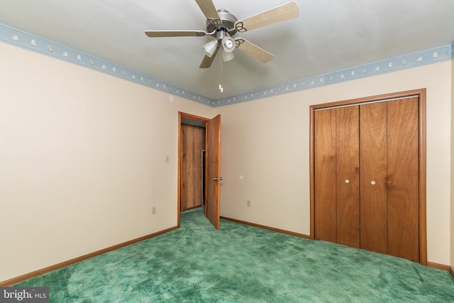 unfurnished bedroom with ceiling fan, a closet, carpet, and baseboards