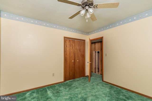 unfurnished bedroom featuring a ceiling fan, carpet, baseboards, and a closet