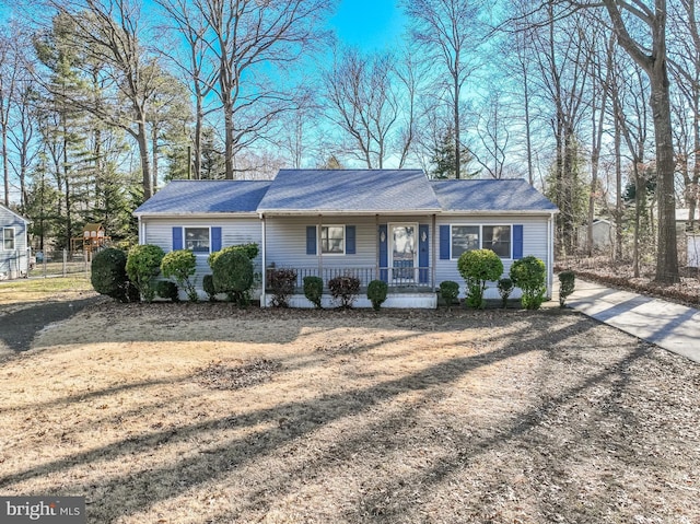 ranch-style house with covered porch