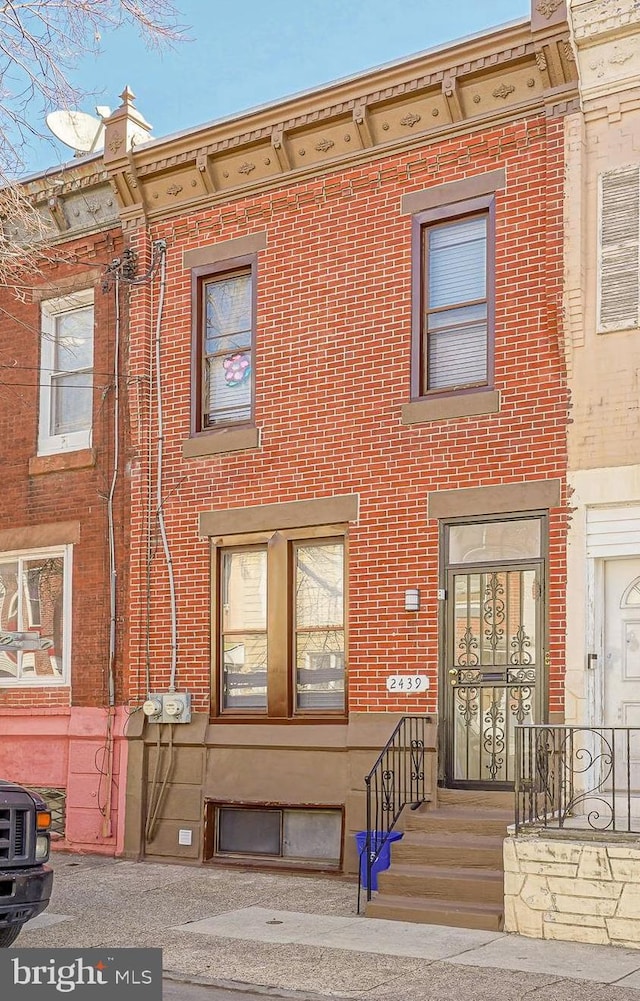 multi unit property featuring brick siding