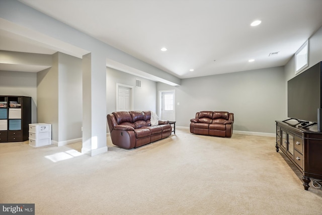 living area with carpet, visible vents, baseboards, and recessed lighting