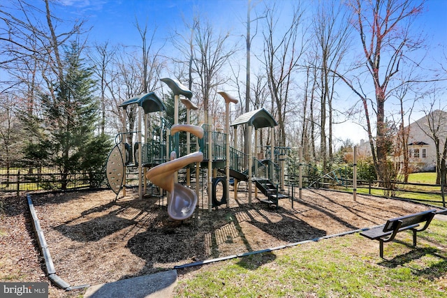 communal playground featuring fence