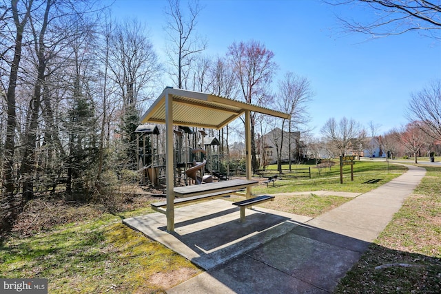 surrounding community featuring playground community and a lawn