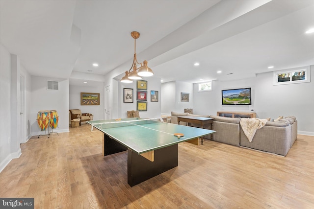 recreation room featuring light wood-style floors, recessed lighting, and visible vents