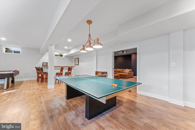 game room with recessed lighting, light wood-style flooring, and baseboards