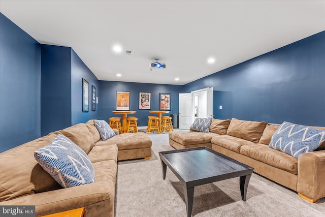 carpeted living room featuring recessed lighting