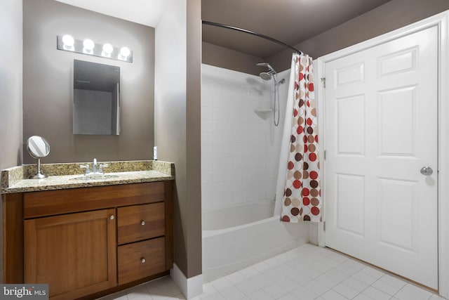 full bath with tile patterned flooring, shower / tub combo with curtain, and vanity