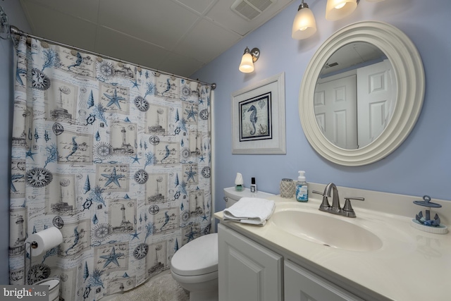 full bathroom with a shower with curtain, visible vents, vanity, and toilet