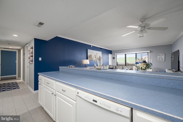 kitchen featuring light tile patterned floors, open floor plan, white dishwasher, light countertops, and white cabinetry