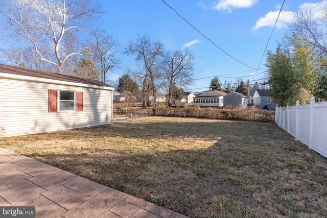 view of yard with fence