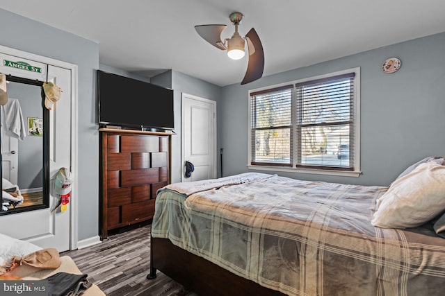 bedroom featuring ceiling fan and wood finished floors