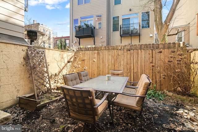 view of patio / terrace with fence and outdoor dining area